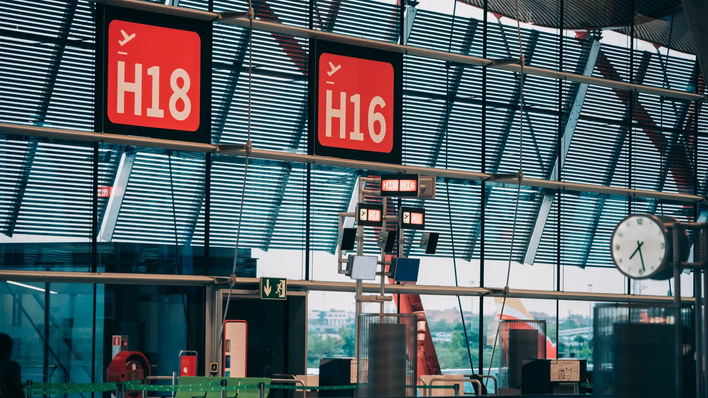 Airport gate signage for long-haul NRI arrivals before Kailash Yatra